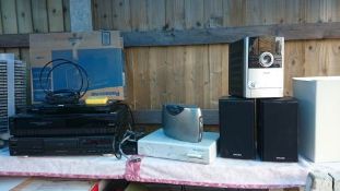 A music centre, DVD player, & Sky box etc.