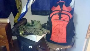 A new backpack and a quantity of hand and vanity bags