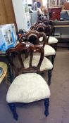 A set of 4 mahogany dining chairs