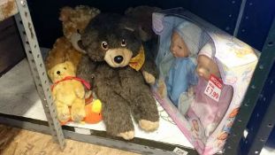 A quantity of soft toys and dolls