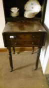 A Victorian 2 drawer drop side table with false drawers in back