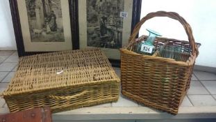 A picnic basket and a wine basket with contents