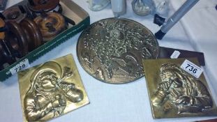 An early Japanese bronze hand mirror and a pair of 19th century brass plaques