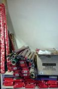 A large quantity of Christmas wrap, cards etc