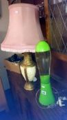 A lava lamp and one other
