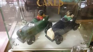 2 pottery racing car models