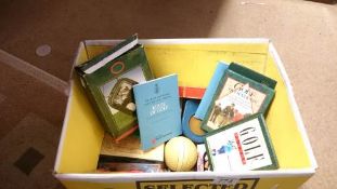 A box of sporting miscellaneous items