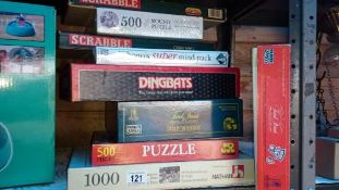 A quantity of games & jigsaw puzzles