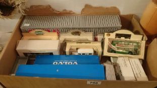A box of boxed die cast models