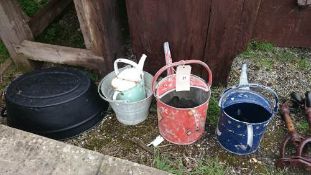 3 watering cans & a bucket