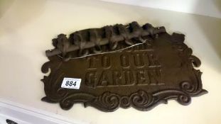 A cast iron sign and cast iron key rack