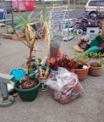 A quantity of garden items including plant pots etc.