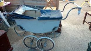 A vintage coach built pram