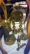 A mixed lot of brassware including candlesticks, jug, gong etc