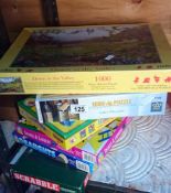 A quantity of games & jigsaw puzzles