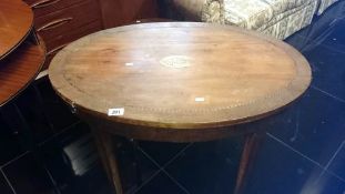 An oval inlaid table