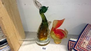 A glass kangaroo and a glass fish