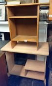 A computer desk and bookshelf