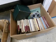 A quantity of film reels including Movie-paks and a splicer