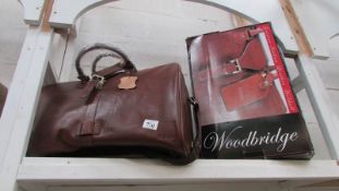A boxed Woodbridge leather holdall