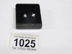 A pair of 20pt white gold and diamond earrings