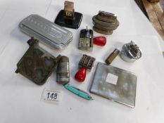 A mixed lot of cigarette lighters etc