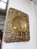 A good hand beaten arts and crafts brass wall candle holder,