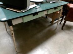 A 1960 formica top table with 2 drawers and metal legs