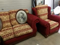 A 2 seat sofa and matching chair