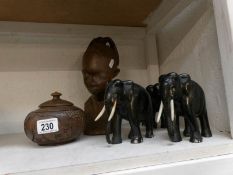 3 ebony elephants,