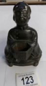 A spelter Chinese attendant match holder