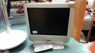 A Philip's Dolby surround flat screen television with remote