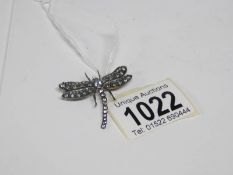 A dragonfly brooch set diamonds and topaz
