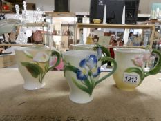 A set of 4 Graff porcelain mugs