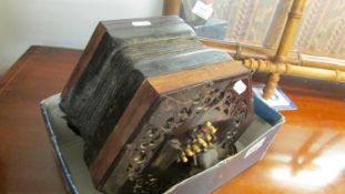 A 19th century 42 button squeeze box for restoration