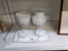A Royal Doulton ginger jar, vase, tray and 2 trinket pots,