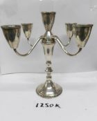 A silver 5 branch candelabra with weighted base