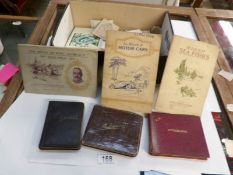 A box of ephemera including autograph books,