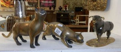 2 brass cats and figure of bull