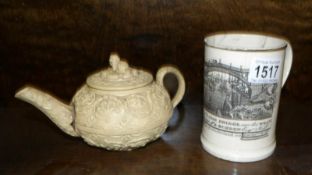 A 19th century frog tankard and a Wedgwood teapot,
