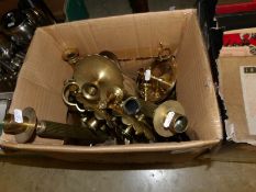 A quantity of brass candlesticks