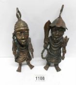 A pair of unusual bronze African warriors