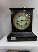 An American Ansonia cast iron mantel clock in working order