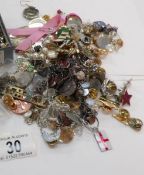 A mixed lot of costume jewellery including Victorian gold brooch a/f, badges,