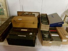 A large quantity of glass lantern slides in 14 boxes