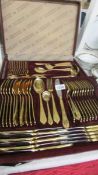 A cased set of SBS gold plated cutlery