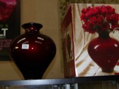 A large boxed European glass vase in red