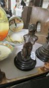 A bronze nude lady on marble base