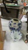 A blue and white Chinese ginger jar and an early blue and white tea cup