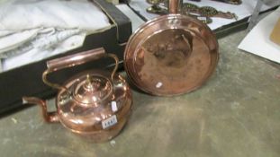 A copper kettle and a copper warming pan